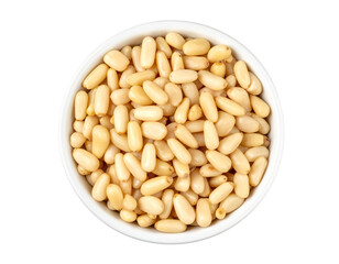 Pine nuts in white bowl isolated on transparent background
