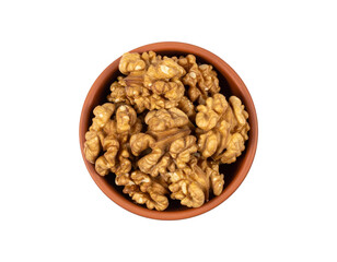Fototapeta premium Shelled walnuts in brown bowl on transparent background