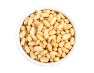 Pine nuts in white bowl isolated on transparent background
