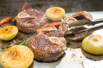 grilled ossobuko steak meat with vegetables