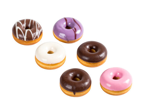Assorted mini donuts in flat lay arrangement on transparent background