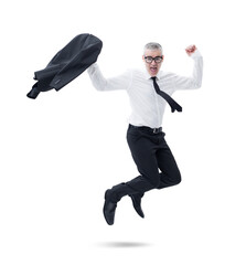 A businessman in a dark suit, jumps joyfully as he celebrates his success.