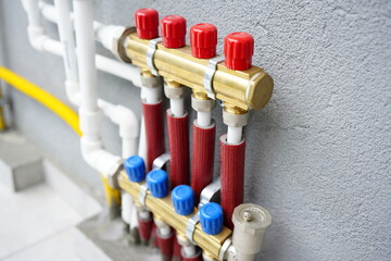 modern collector for heating on the balcony with copper collector and red pipes
