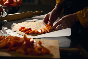 Preparing a Homemade Apricot Pastry With Fresh Fruit and Rustic Techniques