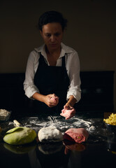 Chef Preparing Colorful Pasta Dough Representing the Italian Flag in a Kitchen Setting