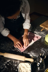 Chef Preparing Colorful Handmade Pasta Ravioli in Rustic Kitchen
