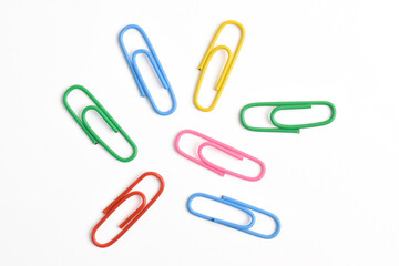 Colorful paper clips isolated on white background