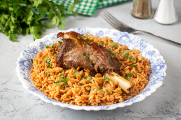 Local Turkish food; Lamb on barley noodle. Turkish name; Ankara Tava or sehriyeli pilav ustu kuzu incik