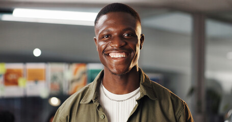 Naklejka premium Portrait, business and happy black man in creative office as graphic designer at internship. Smile, startup and professional employee with confidence, about us or career development for visual artist