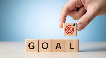 Wooden cubes spelling GOAL with last cube replaced by red target bullseye symbolizing goal setting and success, isolated on transparent background