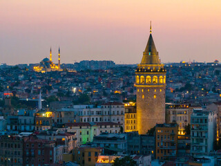 Fototapeta premium Istanbul Icon Galata Tower in the Sunset Lights Drone Photo, Galata Beyoglu, Istanbul Turkiye (Turkey)