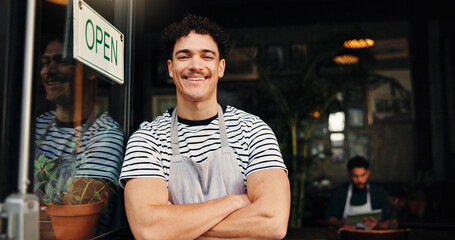 Crossed arms, man and portrait of waiter at coffee shop entrance for welcome, customer service or...