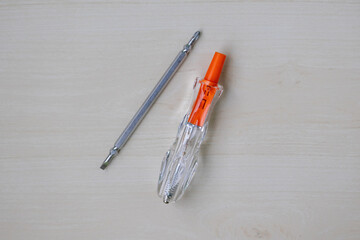 Versatile electric voltage tester with star and flat ends. Multi-purpose voltage test driver...