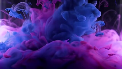 Vibrant blue and purple ink swirls and mixes in water in slow motion creating a stunning abstract colorful fluid art background video - Powered by Adobe
