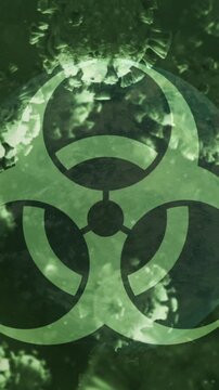 Animation of biohazard symbol and covid 19 cells floating over globe