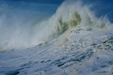 Powerful ocean waves crash along the Hermanus shoreline after a dramatic winter storm, capturing the raw energy and beauty of nature on the Whale Coast, Overberg, Western Cape, South Africa.
