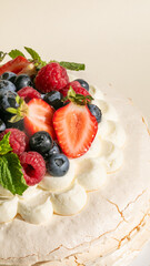 Berry-adorned pavlova, a whimsical cloud of sweetness, perfect for Midsummer festivities or National Dessert Day indulgence