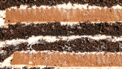 Rich layers of chocolate and cream echo festive indulgence, perfect for World Chocolate Day or...
