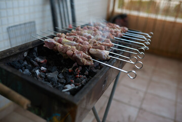 raw meat on the grill