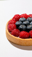 Juicy berry tart encapsulating midsummer's harvest magic, harmonizing culinary artistry and Nordic Midsummer festivities with a flaky, sweet embrace