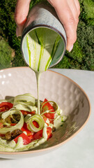 Culinary alchemy of avocado lime drizzle over vibrant salad whispers spring equinox renewal, raw...
