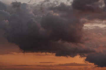 Sunset clouds in the sky in summer evening