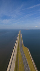 Afsluitdijk, The Netherlands, flood barrier in the Netherlandsthat separates the IJsselmeer from the Wadden Sea. Road, infrastructure.