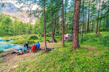 Family on the campsite. Embarking on a backcountry camping adventure with your family can be one of the experiences, blending nature’s beauty with quality lifetime together. 