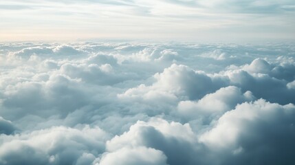 Fototapeta premium Soft and Fluffy Clouds in a Clear Sky Above the Earth During Daylight