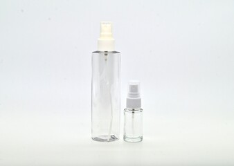 Collection of empty glass bottles sitting together on a surface