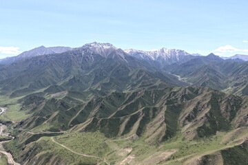 Naklejka premium The aerial view of Qilian grassland and Qilian Mountains