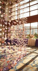 Multicolored paper star decorations hang in a large space.