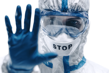 Close-up of a person in PPE extending their hand, signaling 'Stop'.