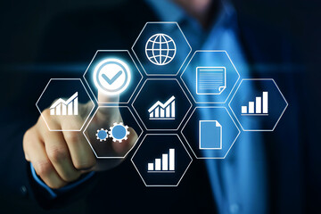 Person touching digital interface with data analytics icons