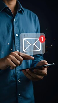 Email Notification: One man in a blue shirt checks his phone for a new message with sparkling notifications