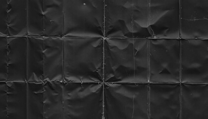 scan of dark paper texture with crazy folding marks.
