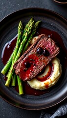 a plate of wagyu steak with truffle mashed potatoes, grilled asparagus, and red wine reduction, overhead food styling, elegant presentation on dark ceramic plate, soft directional light
