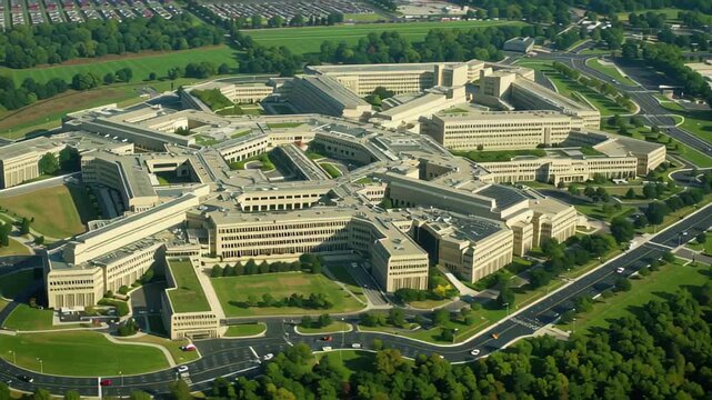 Aerial perspective of the Pentagon building surrounded by green spaces and open roads, Aerial view of the Pentagon building