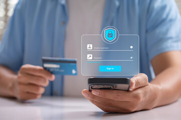 Secure login mobile banking concept. user holds credit card with mobile banking authentication,...