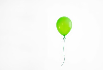 A vibrant green balloon floats, tied with a delicate ribbon, against a pure white backdrop, studio, illustration