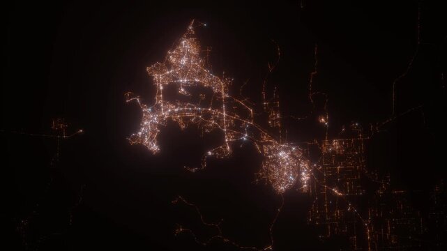 Darwin (Australia) aerial view at night. View on modern city from space. Camera is zooming in, rotating counterclockwise