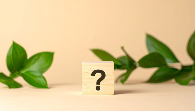 Wooden block with question mark, green plants on backdrop. FAQ and QA. Problem solution. - Powered by Adobe