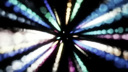 Abstract high speed light tunnel of colorful bokeh particles in a seamless loop animation - Powered by Adobe