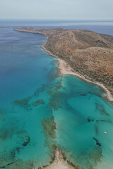 Stunning colours of Balos Lagoon in Crete. Crystal-clear turquoise sea attracting tourists from around the world
