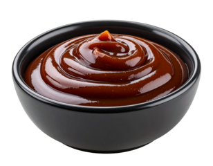 Glossy barbecue sauce swirl with peak in black bowl on transparent background
