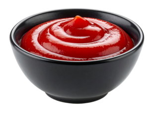 Glossy ketchup with peak swirl in black bowl on transparent background