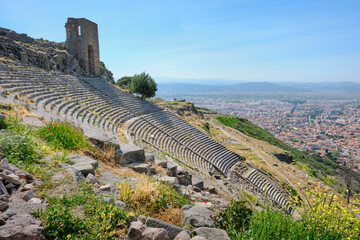 Hstoric greek theater at Pergamon archaeological site with views of the modern city Bergama, Turkey.