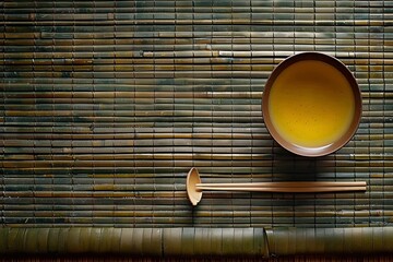 Aerial view of bamboo mat displaying traditional chinese cuisine with classic chopsticks arrangement