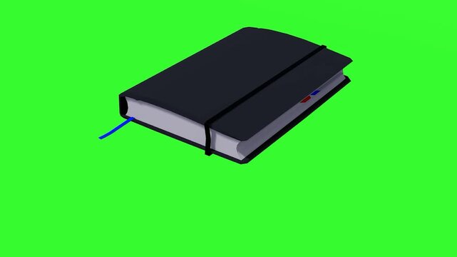 A closed black journal with a blue bookmark and elastic band is set against a green screen. Suitable for business, education, personal planning, or virtual backgrounds.
