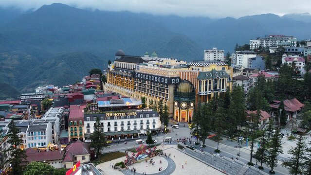 Sapa Vietnam - Aerial Drone View of Mountain Town at Late Afternoon